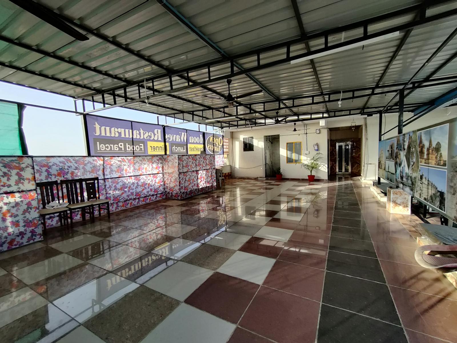 Parent checking airline pushchair policy on phone